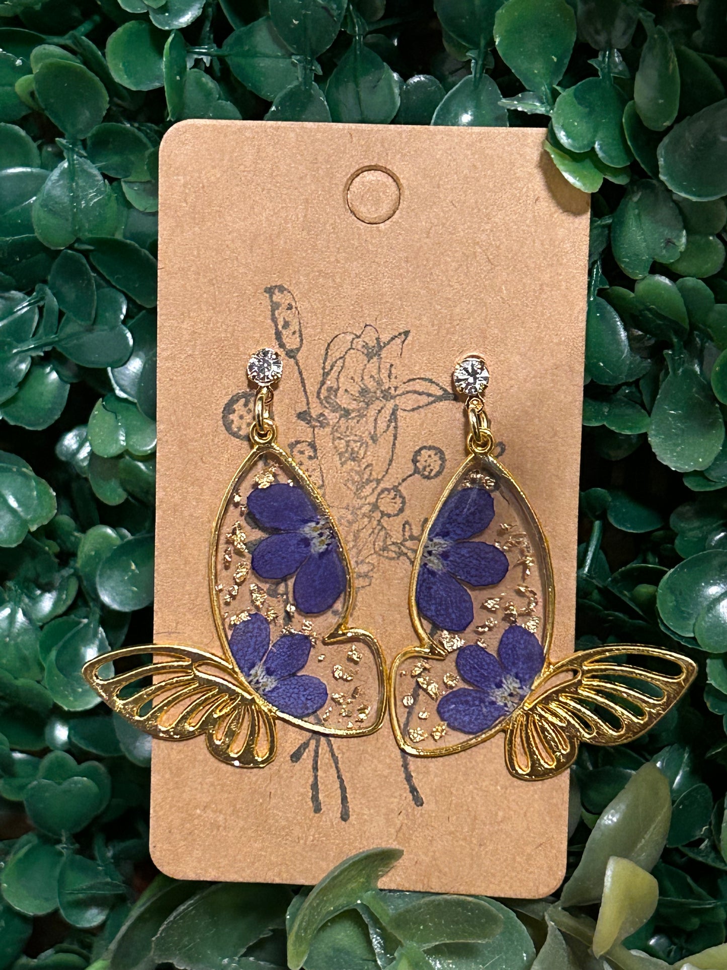 Gold flakes and blue flower butterfly earrings