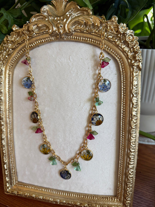Gold charm necklace (pearlescent & sapphire)
