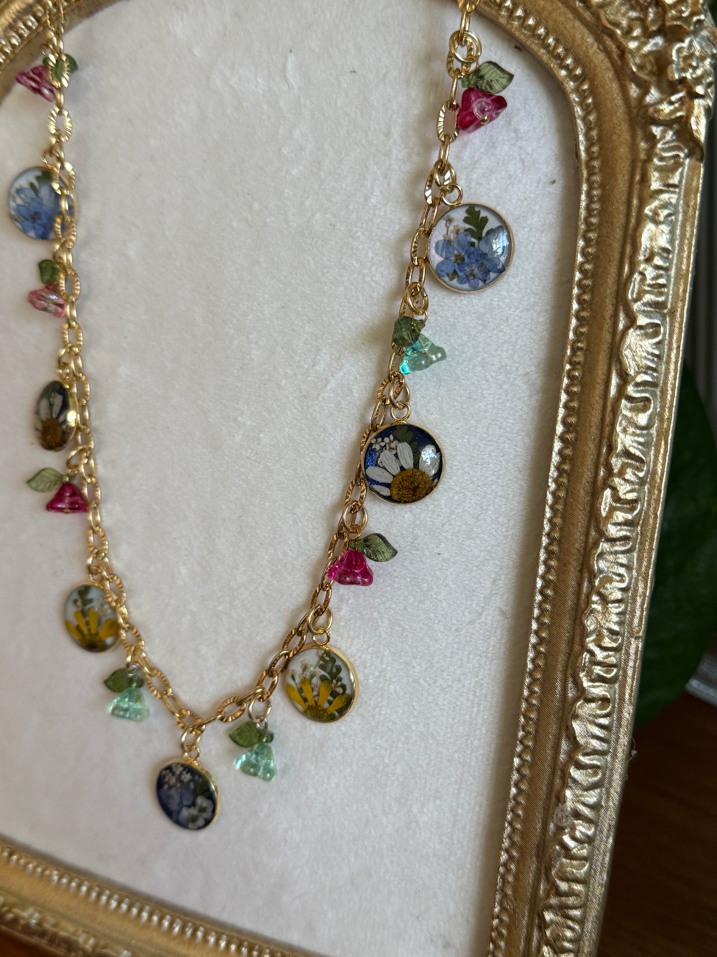 Gold charm necklace (pearlescent & sapphire)