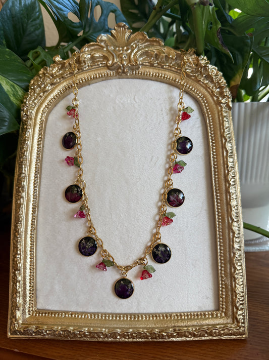 Gold charm necklace (black resin)