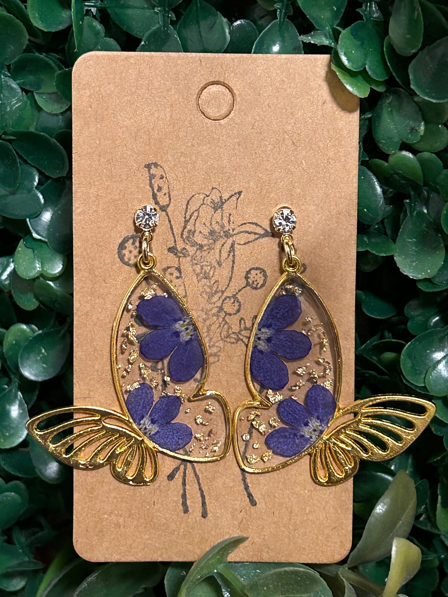 Gold flakes and blue flower butterfly earrings