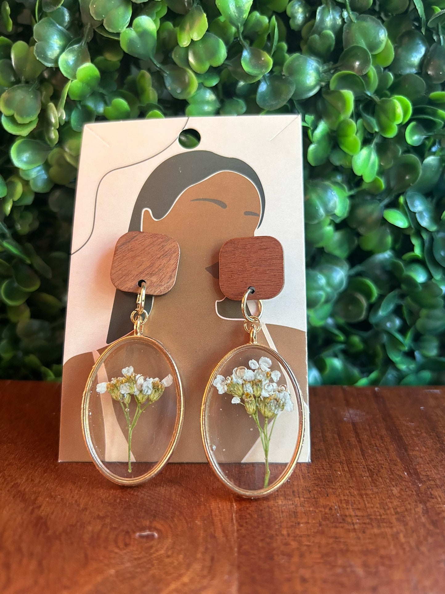 Pressed flower earring reveals