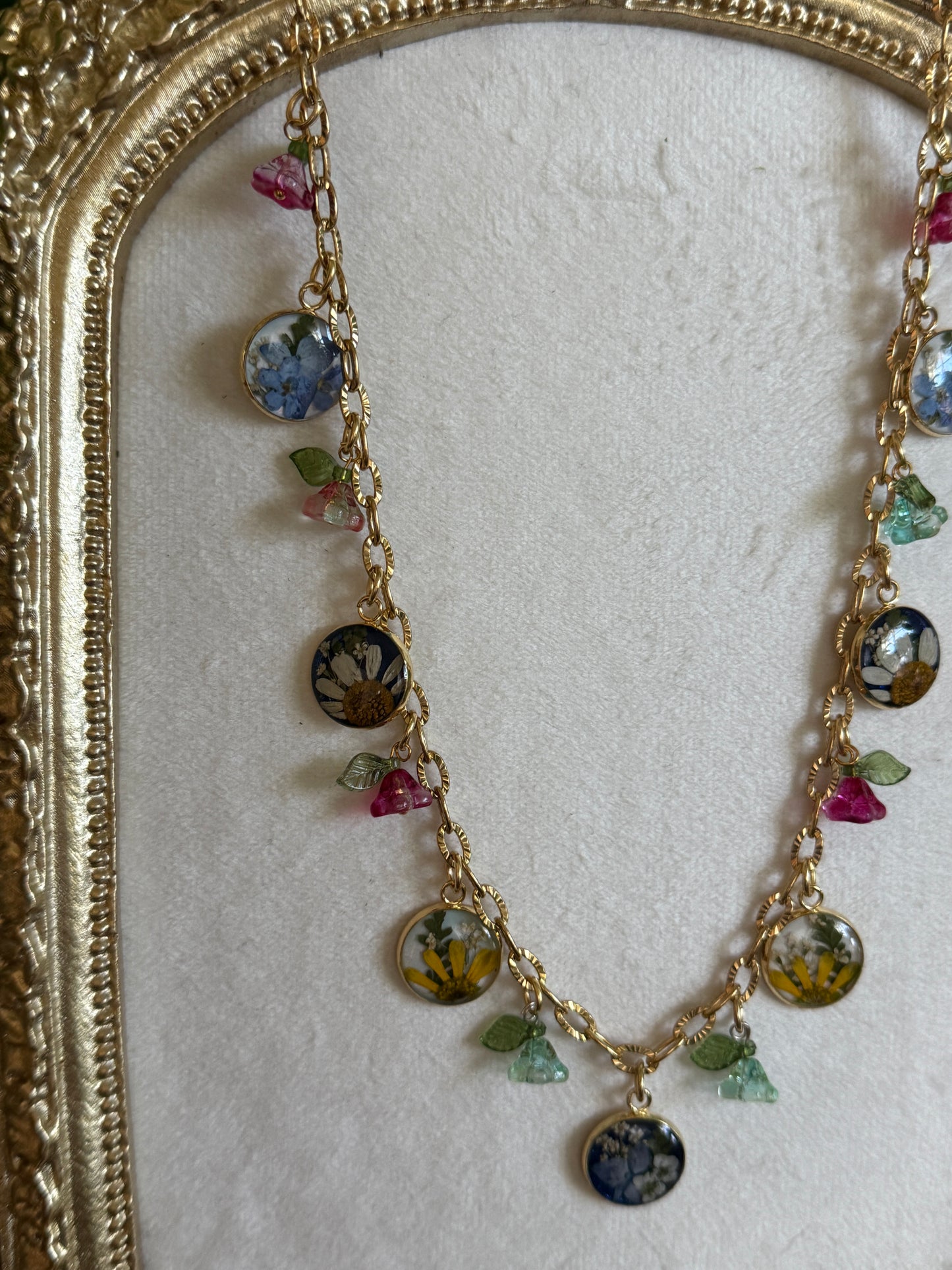 Gold charm necklace (pearlescent & sapphire)