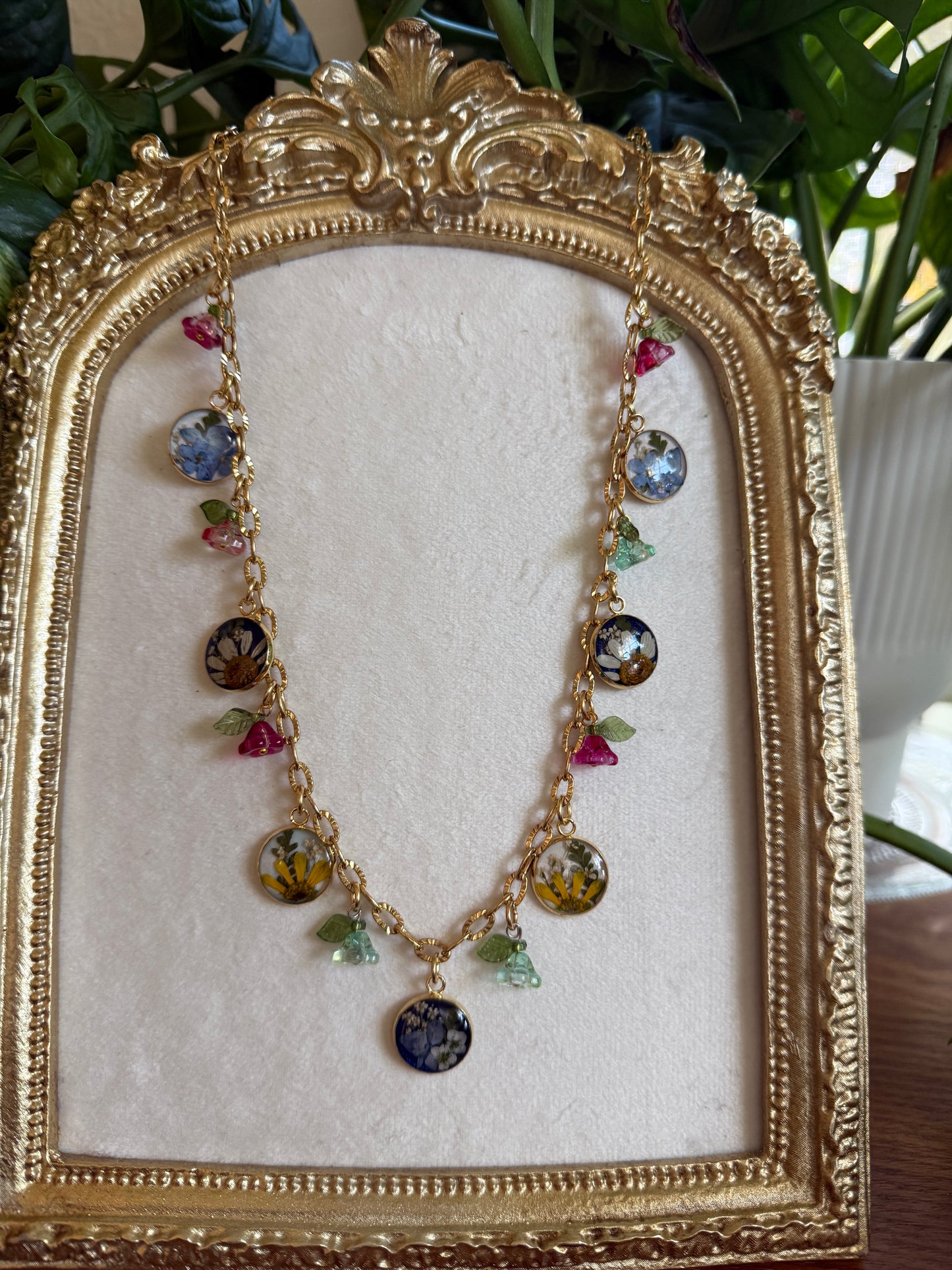 Gold charm necklace (pearlescent & sapphire)
